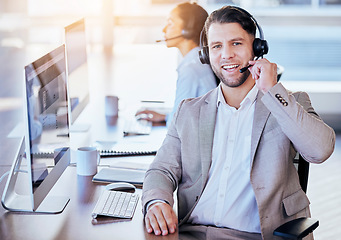 Image showing Man, call center and microphone with smile in office for crm, contact and customer service job. Consultant, happiness and listening on voip call for tech support, advice or telemarketing in workplace