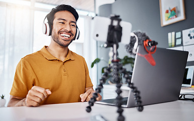 Image showing Smile, streaming and an Asian man with a phone for a video call, communication or podcast. Happy, laughing and entrepreneur talking on a webinar, mobile broadcast or recording conversation in office