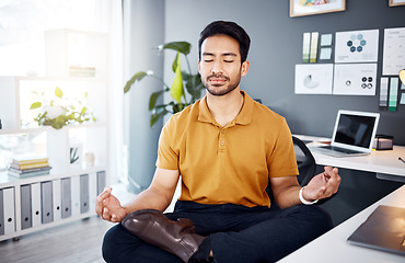 Image showing Office, yoga and business man in office for break, mental health and breathing exercise at a desk. Corporate, meditation and asian guy manager meditating for stress management, zen and peace in Japan