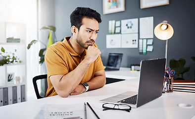 Image showing Thinking, laptop and business man with online research, website design planning and working in creative office. Focus, serious and designer or asian person on computer with project decision or ideas