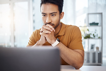 Image showing Laptop, business and Asian man with focus, thinking and ideas for new project, creativity or online reading. Male entrepreneur, professional or worker with technology, decision or choices for startup