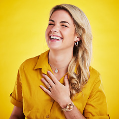 Image showing Woman, laughing and happy in studio with joke, comedy or funny reaction against gradient yellow background. Comic, relief and female laugh, relax and meme, good mood and happiness while isolated