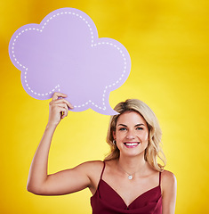 Image showing Portrait, smile and woman with speech bubble for social media in studio isolated on a yellow background. Poster, mockup and happy female person with advertising banner, marketing opinion and voice.