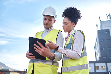 Image showing Architect, tablet and construction in planning, idea or collaboration for project plan in the city on site. Man and woman contractor working together on technology for architecture ideas or building