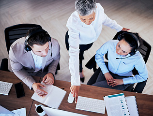 Image showing Business people, call center and coaching on computer above in customer service or support at office. Telemarketing coach training staff on desktop in teamwork, collaboration or advice in contact us