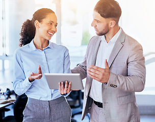 Image showing Business people, tablet and idea in team collaboration, planning or strategy at the office. Happy woman showing businessman ideas for project plan, design or solution on technology at the workplace