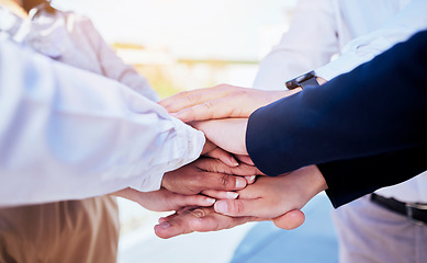 Image showing Business people, hands together and teamwork in agreement, collaboration or meeting outdoors. Group of employees in team building piling hand for unity, partnership or coordination in solidarity
