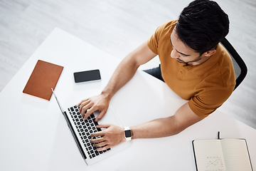 Image showing Top view, business man typing and laptop in office for planning schedule, web research and seo job. Businessman, computer or website management in startup company for analysis, focus or communication