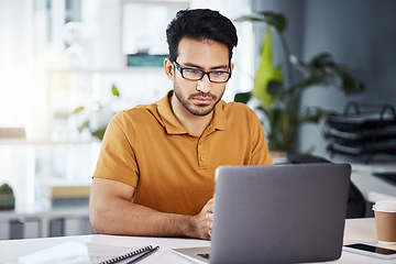 Image showing Focus, laptop and business man with online data analytics, market research and social media review in office. Serious, planning and analyst or asian person on computer for company website management