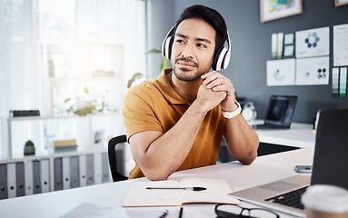 Image showing Business man, thinking and headphones to listening to music, audio or podcast. Asian male entrepreneur at desk with headset to think of ideas, strategy and plan for growth development and future