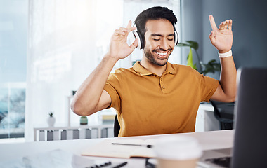 Image showing Man, laptop and headphones with music during remote work, happy and enjoy listening to radio. Male copywriter, energy with blogger dancing and technology, online audio streaming and working from home