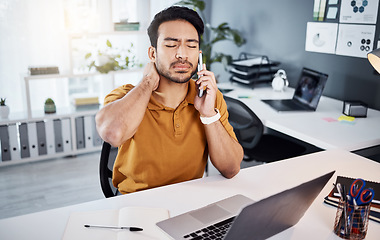 Image showing Business man, phone call and neck pain or stress at office desk with a laptop and depression. Asian male entrepreneur with technology and depression, mental health or burnout while tired and working