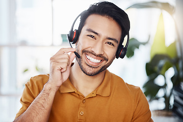 Image showing Man with smile in portrait, call center employee and contact us with headset and microphone, CRM and help desk agent. Happy male consultant, communication and tech, customer service job and telecom