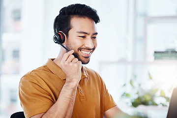 Image showing Happy man with smile, callcenter and phone call with contact us, headset and microphone with CRM. Male consultant, communication and tech with customer service job, telecom and help desk agent