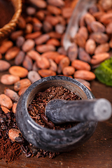 Image showing Cocoa beans in stone mortar