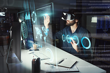 Image showing Virtual reality, business man and touch hologram in office by computer for statistics, analysis or data at night. Metaverse, vr and person with charts, futuristic technology and 3d global overlay.