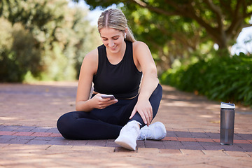 Image showing Relax, phone and fitness with woman in park for social media, network and technology. Running, workout and training with female runner in nature for connection, communication and connection