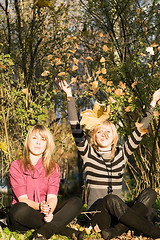 Image showing Two beauty young women in autumn park