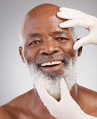 Image showing Skincare portrait, face and man with gloves, happiness or professional anti ageing spa treatment in studio. Dermatology, cosmetics and mature African model with cosmetic skin care process at salon