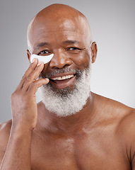 Image showing Skincare, eye pad or portrait of man with smile, happiness and anti ageing face treatment. Dermatology, cosmetic grooming or happy, mature and African model or collagen eyes mask on white background