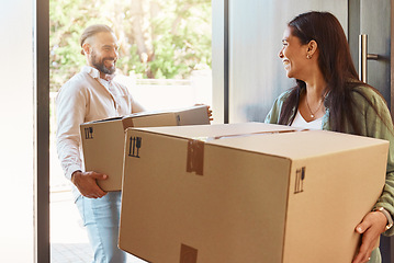 Image showing Happy couple, boxes and moving in new home, property or real estate with cardboard box indoors. Man, woman and smile in happiness for mortgage loan, investment or purchase carrying packages inside