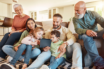 Image showing Love, home and family on a couch, tablet and streaming movies on break, weekend and relax together. Grandparents, mother or father with children, siblings or kids in lounge, social media and chilling