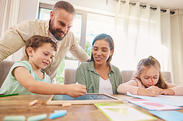 Image showing Family, education and homework with a boy writing on a chalkboard while his parents supervise his learning. Kids, school or study with children, a mother and father at home for growth or development