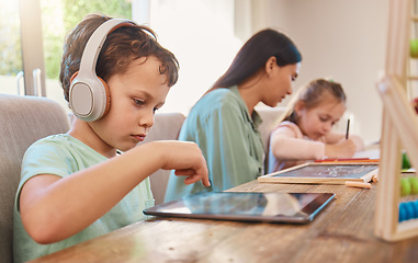 Image showing Elearning, home school and child with tablet, headphones and online class with video lesson or educational mobile app. Future education, internet and digital classroom for kindergarten kids with mom.