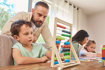 Image showing Education, home school and father with his child with abacus helping him work on math homework. Study, knowledge and young dad teaching his son to count mathematics in the dining room of family home.