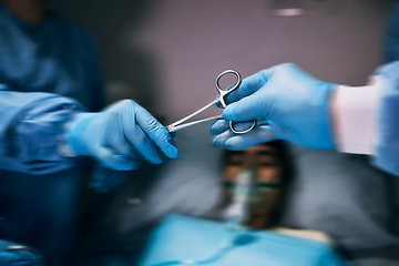 Image showing Hospital scissors, surgery and doctors hands in theatre for medical support, teamwork or patient with healthcare zoom. Doctor, nurse or surgeon team work, giving tools and helping in operating room