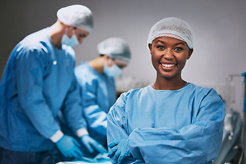 Image showing Surgery, portrait and black woman doctor in theater for hospital teamwork, leadership and medical internship. Happy surgeon, nurse or healthcare person arms crossed in operating room or theatre