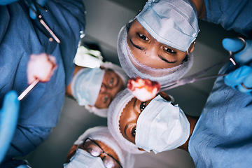 Image showing Medical, surgery and pov of doctors in operating room for emergency, healthcare and teamwork. Insurance, medicine and treatment with group of people for injury, surgeon and operation from bottom