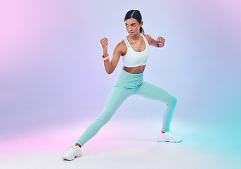 Image showing Fitness, woman and fighting pose in studio for karate, martial arts or defence training on gradient background. Power, sports and indian female in intense workout, exercise and posing while isolated