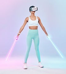 Image showing Fitness, virtual reality glasses and woman with lightsaber, futuristic and player against studio background. Female gamer, person or confident girl with vr eyewear, fantasy weapons and laser saber