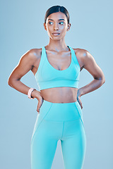 Image showing Thinking, body and a woman for fitness in gymwear isolated on a studio background for exercise. Idea, sports and an Indian girl standing in workout clothing for training or a cardio idea for health