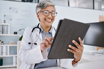 Image showing Senior doctor, happy woman with tablet and digital medical results with hospital schedule and healthcare information online. Female physician, health insurance and professional in medicine with tech