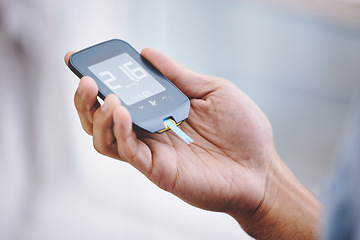 Image showing Hands, diabetes and sugar with a man in his home holding a blood glucose meter for disability awareness. Healthcare, medical and measurement with a diabetic male testing insulin levels in his house