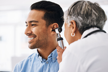 Image showing Doctor check patient ear, healthcare and medical consultation at hospital with otolaryngology specialist. Happy man and physician woman with otoscope, test for hearing problem and health insurance