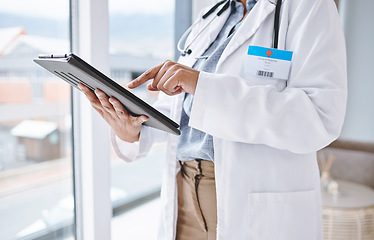 Image showing Doctor, woman with tablet in hands and digital medical results with hospital schedule and healthcare info online. Female physician, health insurance and professional in medicine with technology