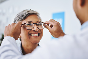 Image showing Optometry, smile and woman with prescription glasses, optician and helping client with product. Female person, employee and optometrist assist with eyewear, clear vision and buying new spectacles
