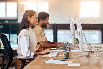 Image showing Happy, coworking office and employees at a desk, working together and communication on computer. Smile, our vision and diversity with workers sitting at a table typing on a pc for a corporate job