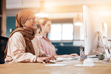 Image showing Computer, office and happy muslim woman coworking, planning and online business or startup company. Diversity people, hijab employee or staff for digital research, technology review and desktop pc