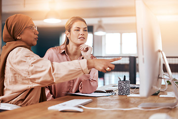 Image showing Teamwork, computer and business women planning, training and coworking or collaboration for online, digital company. Diversity people, muslim manager or leader speaking or show ideas on desktop pc