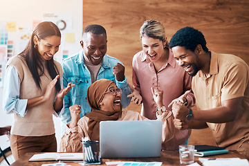 Image showing Winning, laptop and business people in teamwork success, office celebration and online news of bonus, target or goals. Winner employees or diversity women and men celebrate with fist pump on computer