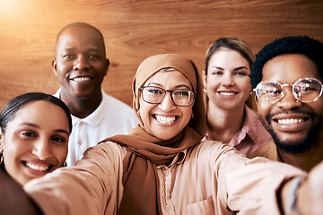 Image showing Work selfie, team diversity and portrait of friends in the workplace, happy company and about us. Smile, together and Muslim woman taking a photo with employees for fun, bonding and office memories