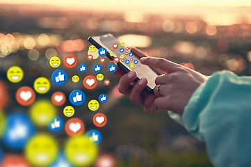 Image showing Hands, social media icon or girl with phone for communication, text chat or online dating. City sunset, emoticons overlay or woman on mobile app or digital network with love, like or heart emoji