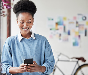Image showing Black woman, business and phone with a smile for communication, social media or online chat. Female entrepreneur person with a smartphone while typing on mobile app and happy about network connection