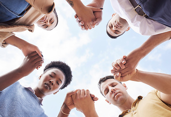 Image showing Holding hands, prayer circle and business people with support, faith and diversity in low angle by sky. Men, woman and praying for worship, gratitude and progress of business with solidarity at job