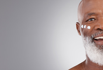 Image showing Skincare, cream and portrait of happy black man for wellness, cosmetics and facial treatment. Dermatology, copy space and male face with lotion for anti aging, wrinkle and beauty on studio background