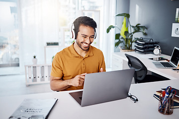 Image showing Business man, laptop and headphones to listen to music, audio or webinar. Asian male entrepreneur at desk listening to a song or video call while online on social media with internet connection